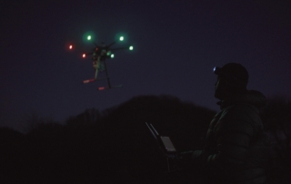 Professional drone pilot working on a dark morning with his S4 headlamp